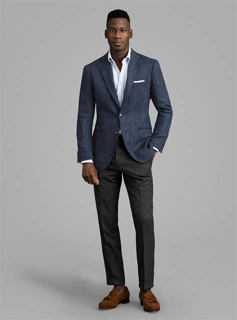 navy blazer with grey pants.